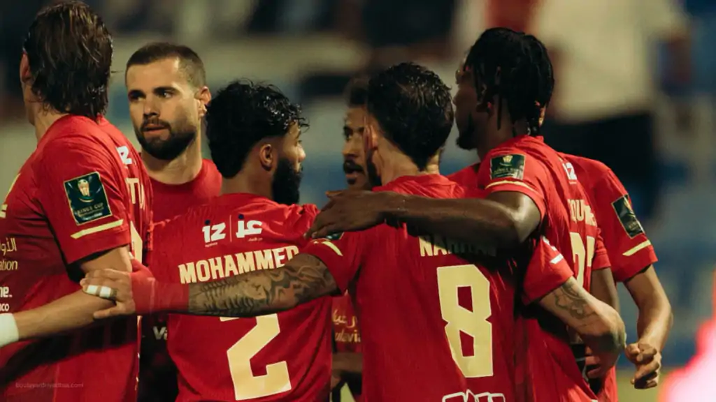 Al Qadsia players celeberiting goal