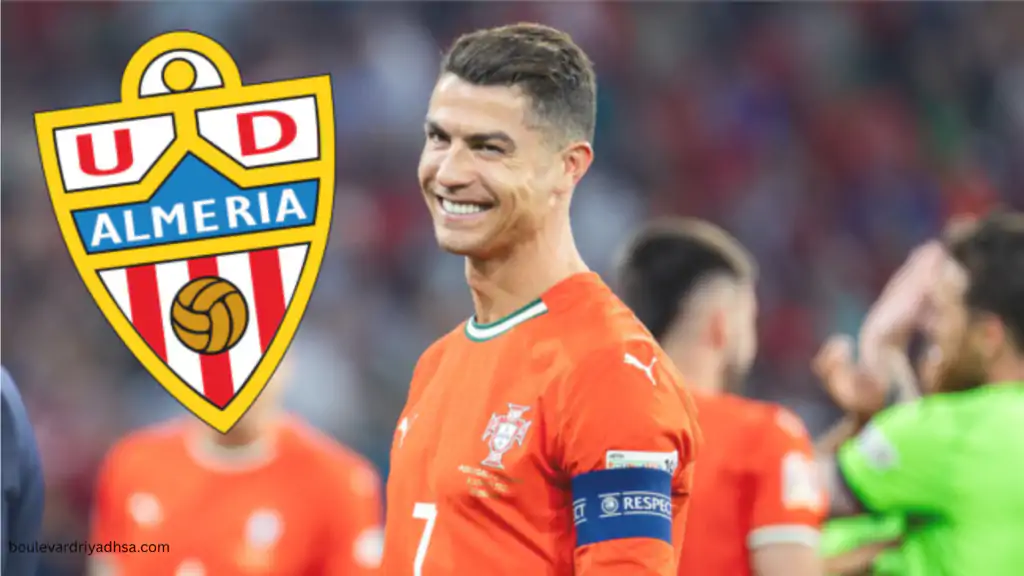 Cristiano Ronaldo smiling in Portugal kit next to UD Almeria crest after buying 25 percent stake in the Saudi-owned Spanish club